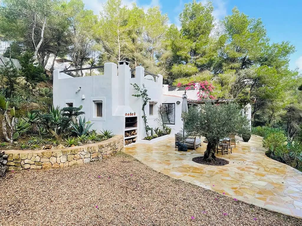 Photo of finca style building in Ibiza surrounded by trees